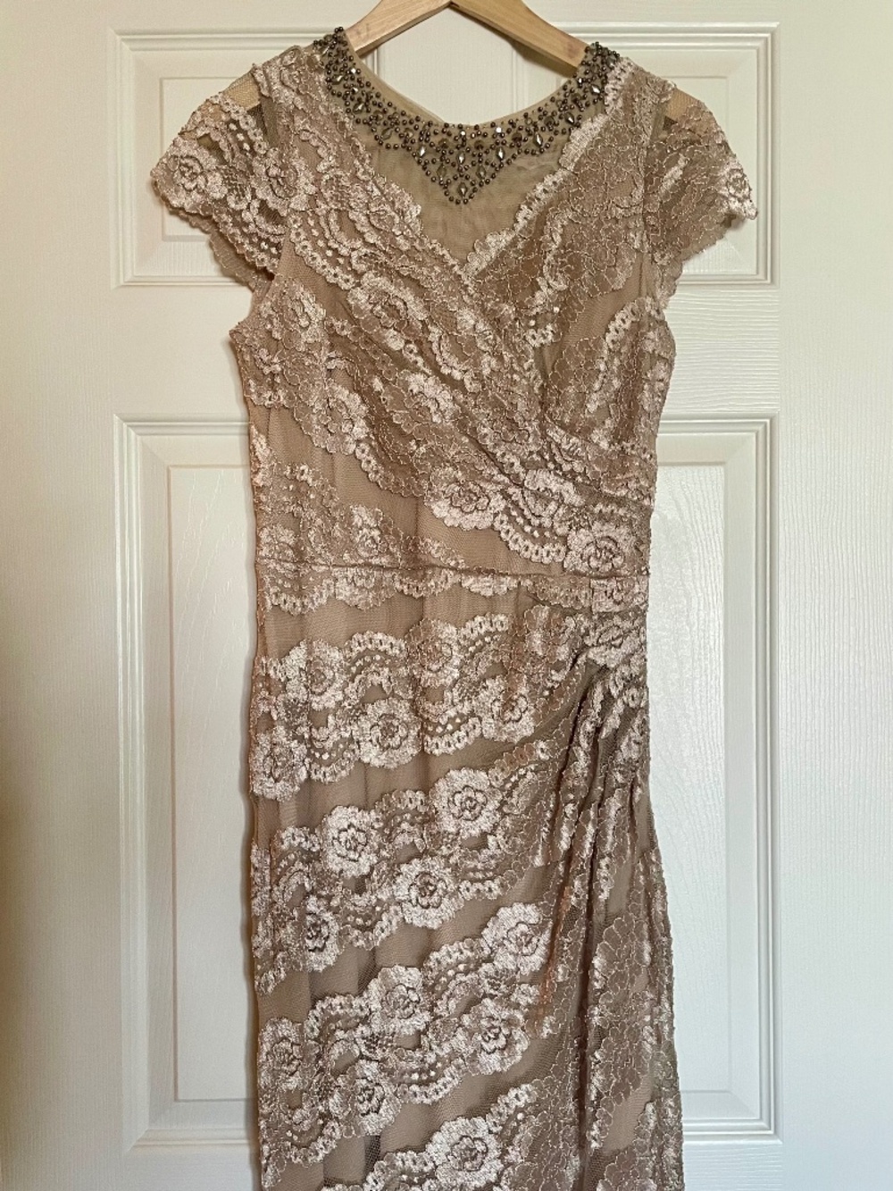 Evening gown with lace overlay and beaded neckline